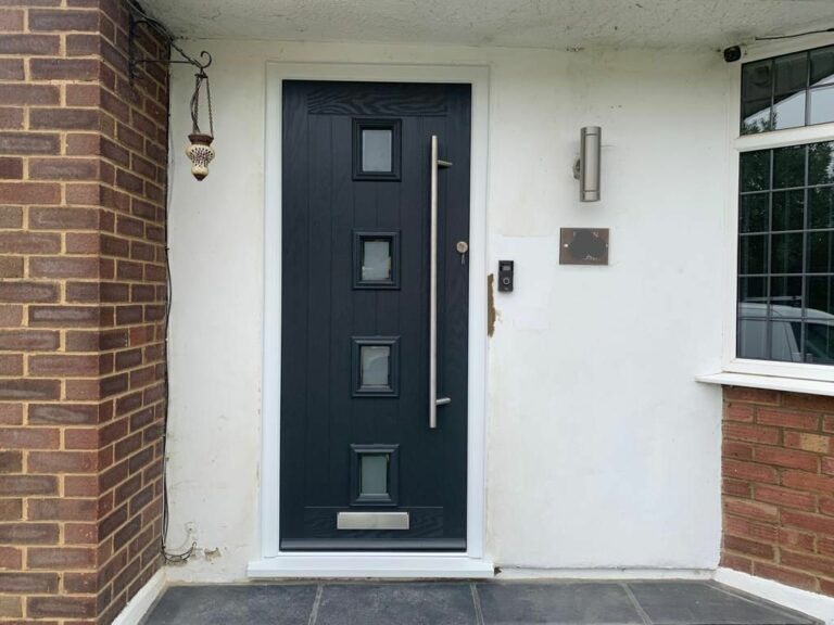 Composite front door, design 4 Square, colour Grey 7016 with long bar handle