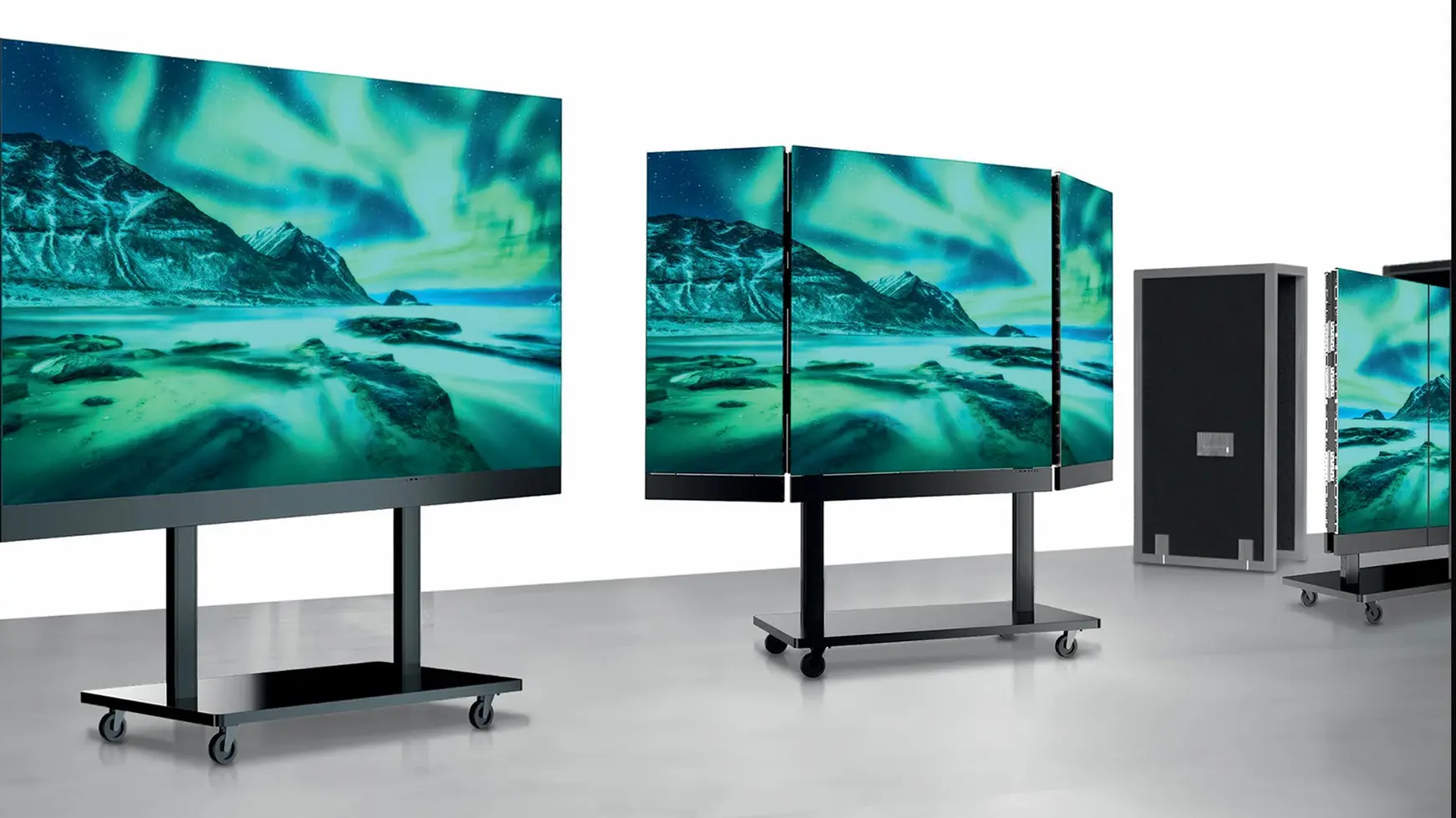 Two Akari Fold displays shown side by side—one folded, one unfolded—to show transition from mobile to full display.