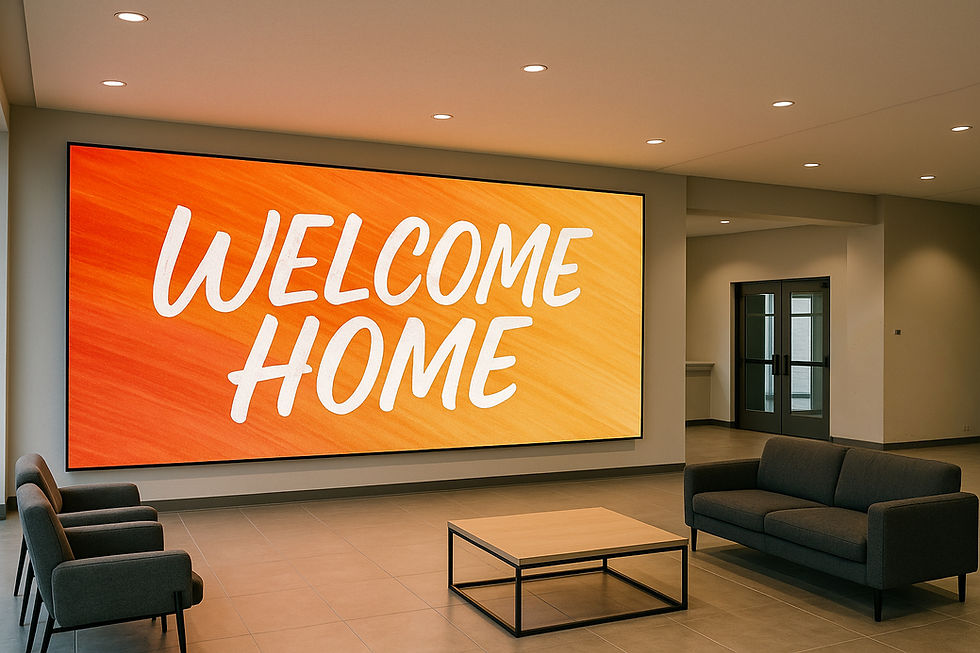 Church lobby with Akari Vision LED display showing “Welcome Home,” creating a warm and inviting atmosphere for visitors.