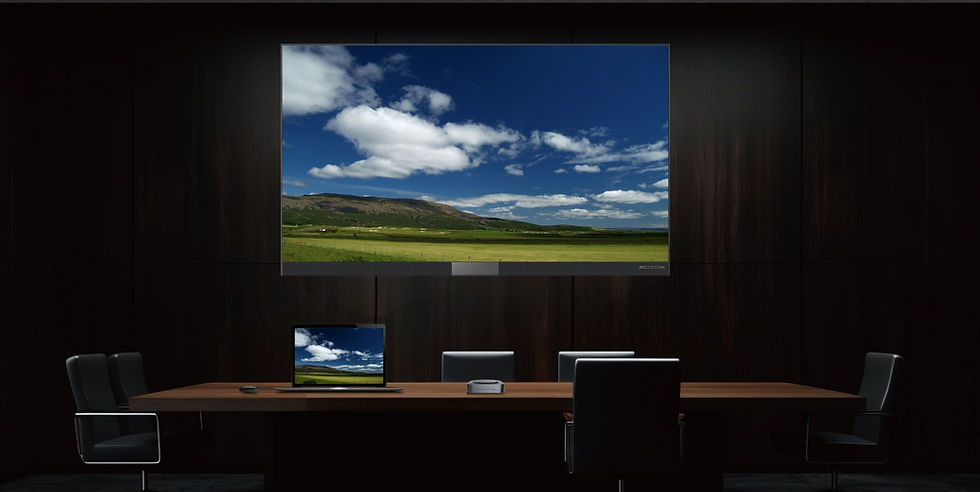Akari One LED display wirelessly mirroring laptop screen in modern conference room.