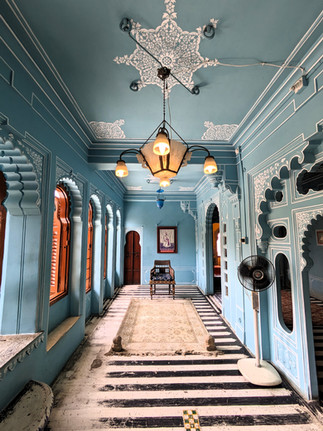 Elegant blue room in the City Palace, making it one of the attractions you should visit in Udaipur, India
