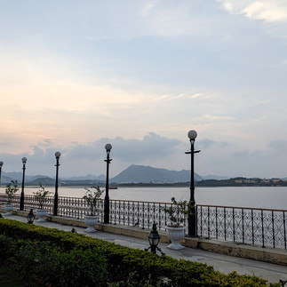 View from Jagmandir of Lake Pichola and the Aravalli Mountains in the background, making it one of the attractions you should visit in Udaipur, India