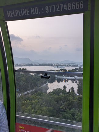 A view of Lake Pichola from the window of a gondola, making it one of the attractions you should visit in Udaipur, India