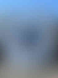 One of the Aberdeen street art murals on a building depicting a girl being lifted by a bird.