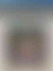 Gateway with an Egyptian winged symbol over the entrance viewed at the Rosicrucian Egyptian Museum during a family day out in San Jose