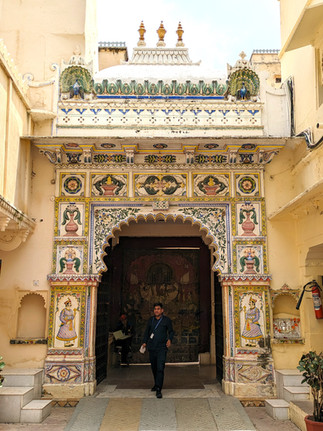 City Palace doorway, with intricate and colourful designs, making it one of the attractions you should visit in Udaipur, India