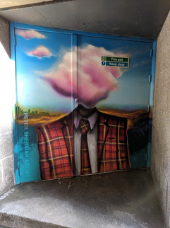 One of the Aberdeen street art murals on a door.