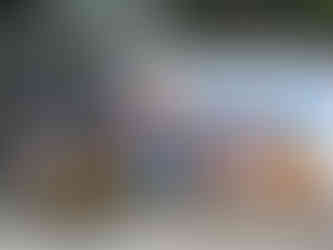 Colourful street art of female figures with water vessels, making it one of the attractions you should visit in Udaipur, India