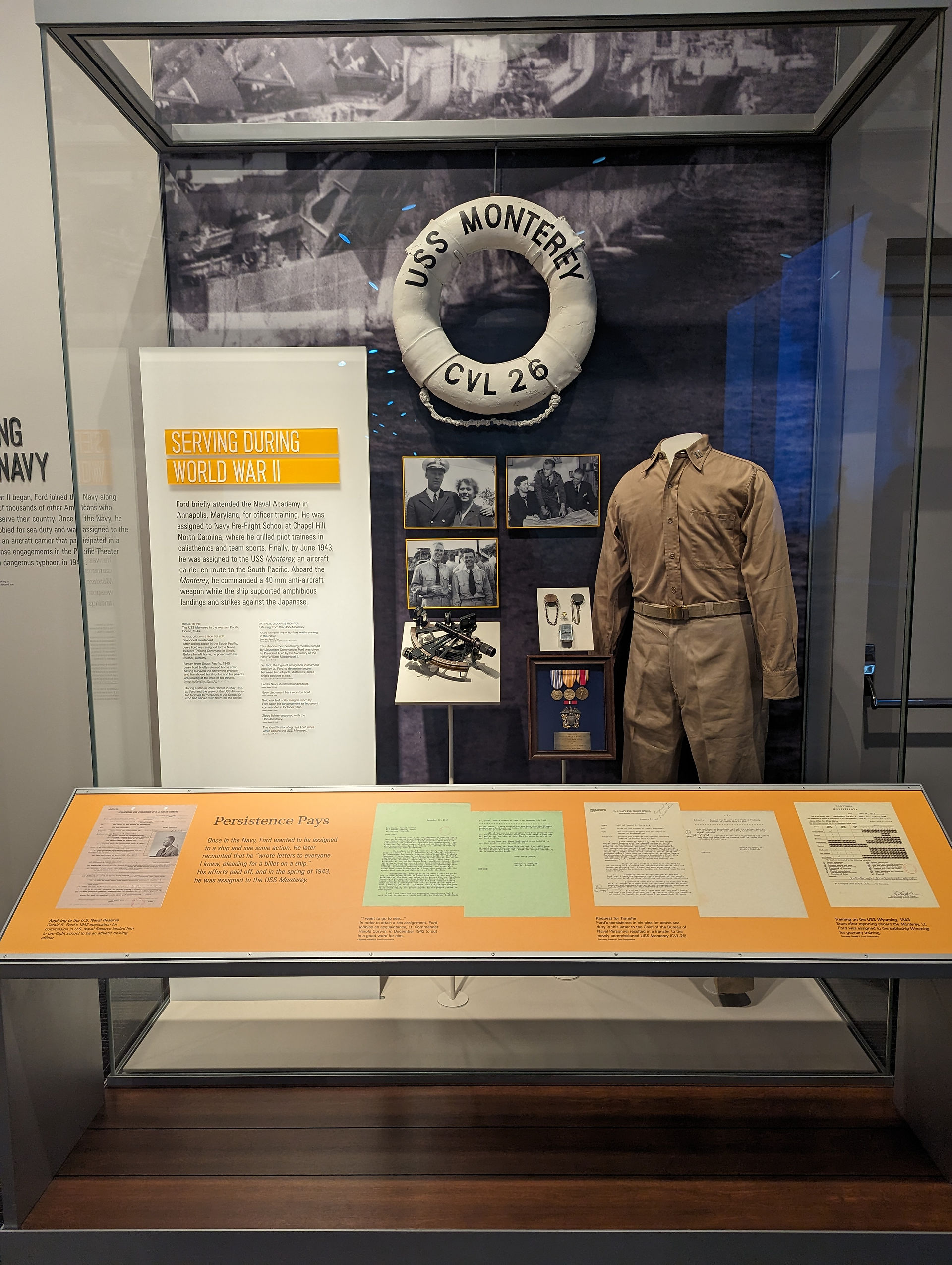 Historical display of Gerald Ford's time in the navy viewed during a family day out in Grand Rapids