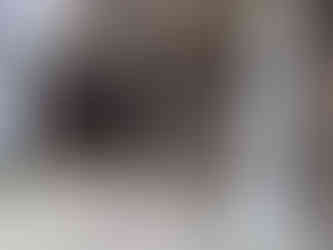 One of the Aberdeen street art murals on a building depicting colourful characters.