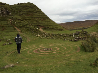 Green landscape with rolling hills which is a perfect place to find the enchanted fairies of Scotland