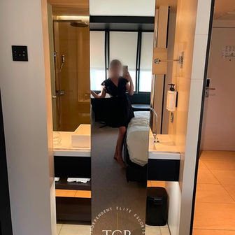 Emily - Real mirror selfie in a dark outfit inside a The Hotel room 