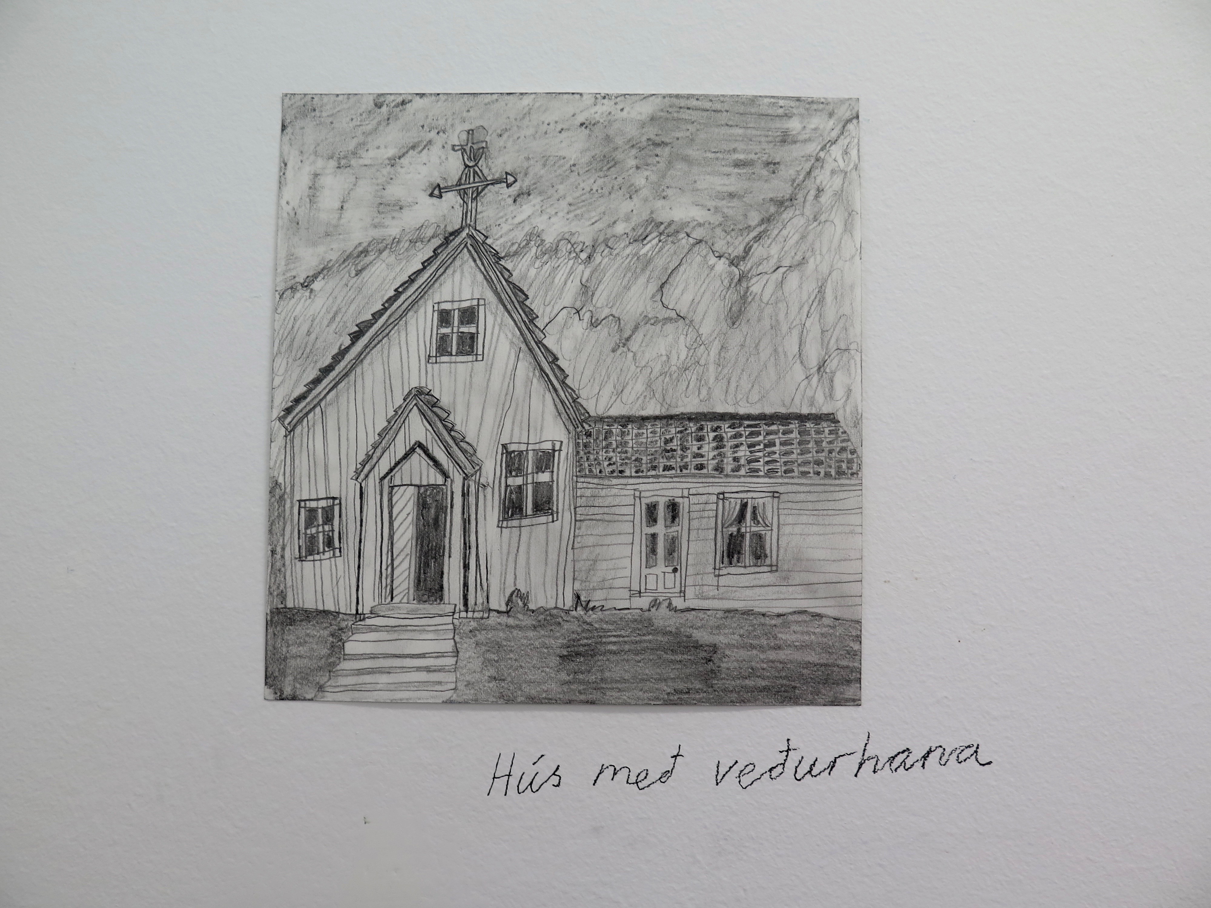 A house with a weather vane
