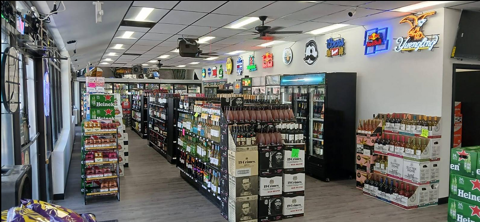 Inside store view featuring beer and wine aisles, coolers, and displays