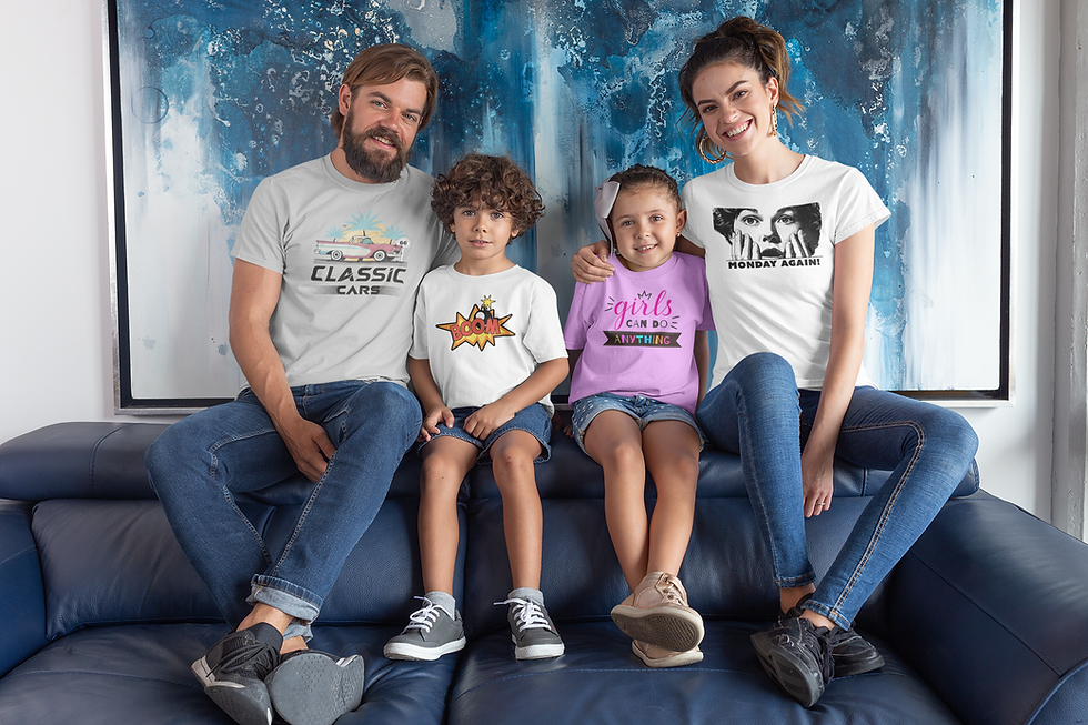 Family of four in custom graphic t-shirts sitting on a sofa
