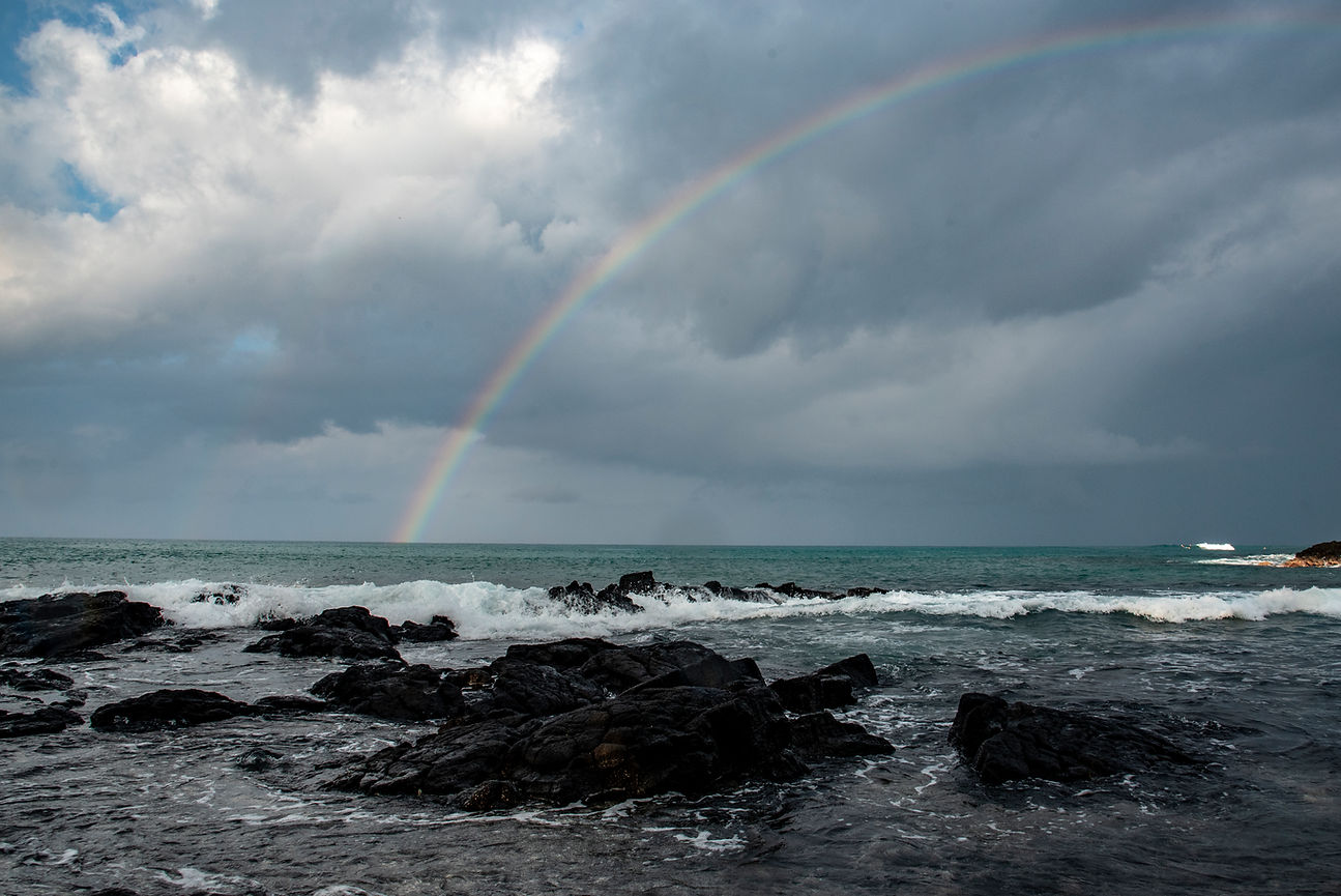 Rainbow in the cloudy skies over the Lyman's bay