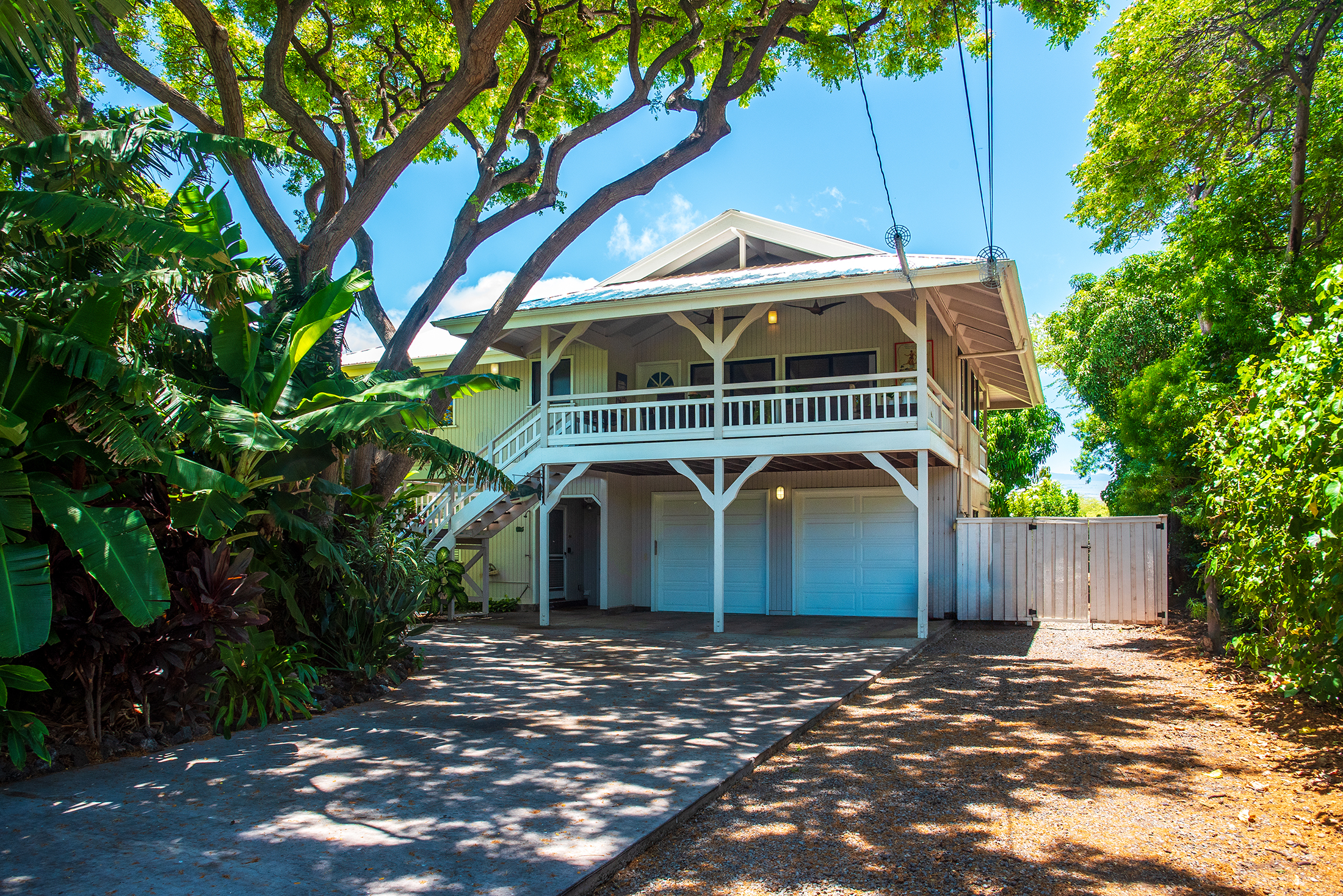 Exterior view of Puako 143 with lush landscaping