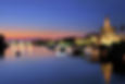 Sevilla by night with view of the river Guadalquivir, Torre del Oro and Puente de Isabel II