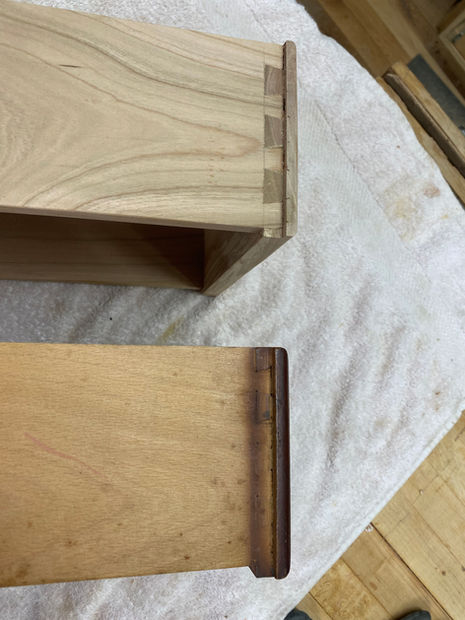 Built a copy of an antique drawer. Full- and half blind handout dovetails in cherry. Hand-turned knob to match. 