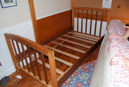 Ash and walnut twin bed with through tenon joinery. Finished in spray lacquer. 