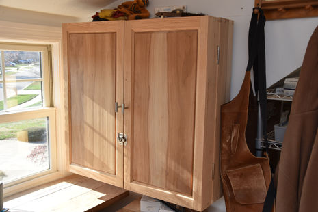 Handtool storage cabinet in cherry and ash. Handcut dovetail case. No finish. 