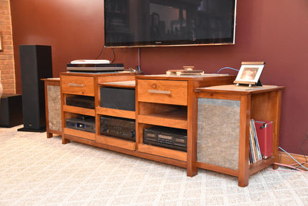 Stereo cabinet in osage orange with slate inlay and storage on each end. 