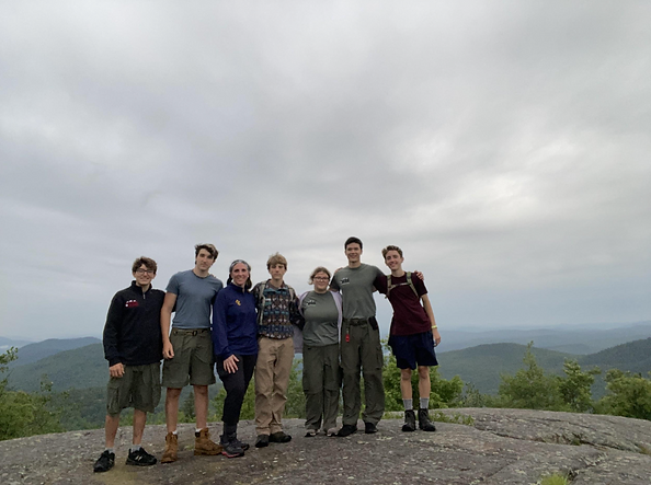Camp Read Group Photo on mountain peak.png