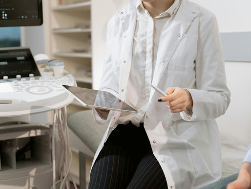 a radiologist reviewing an ultrasound scan