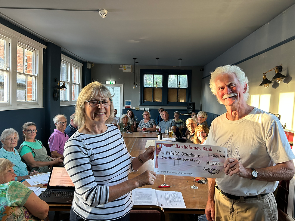 MNDA cheque presentation July 2026.HEIC