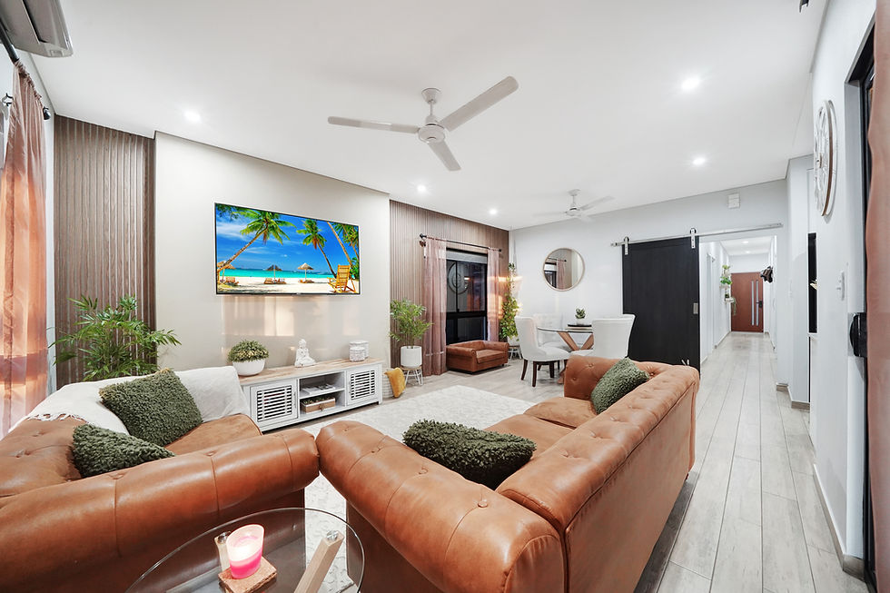Eye-level view of a spacious living room with natural light