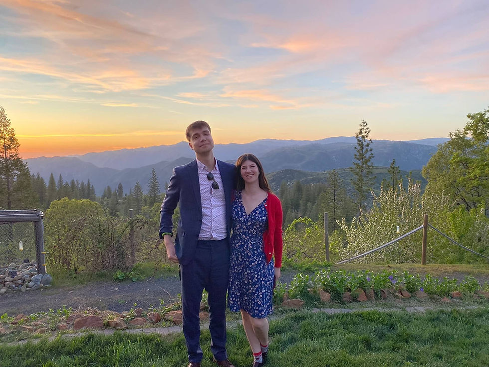 couple in front of mountain sunset Yosemite