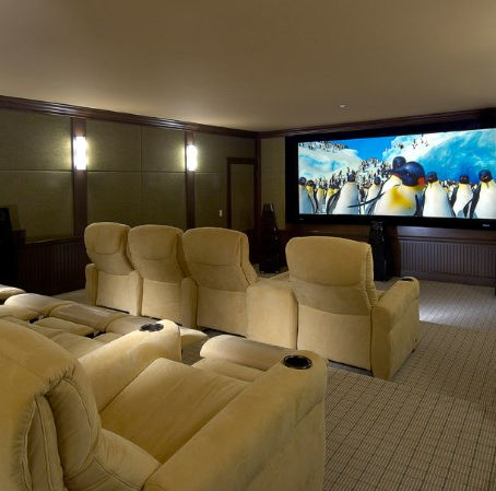 Finished basement renovation in Okotoks Alberta with modern lighting and durable flooring