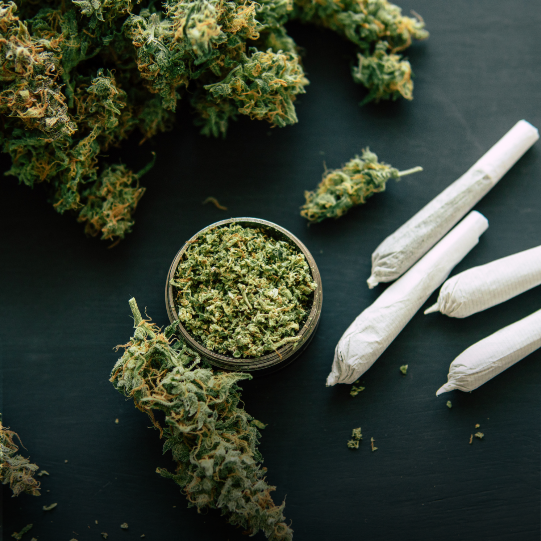 joints cannabis and cannabis inside grinder