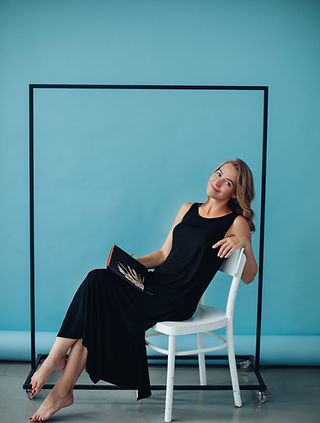 stunning-blonde-black-dress-with-planner-chair.jpg
