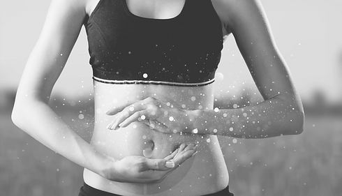 beautiful-woman-s-slim-stomach-hands-showing-balance-her-microflora 1.png