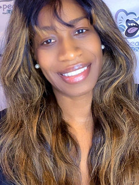 new headshot with pearl earrings_edited.jpg