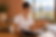 A PMU artist reviews her portfolio of healed brow results — building a strong portfolio is key in the first months of your career