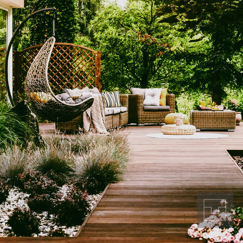 Stunning-backyard-deck-with-hammock-garden-and-trees-2