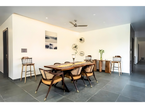 Open-concept living and dining area at Samaya private villa in Hyderabad.