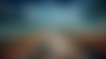 Bride runs along a desert track toward the sea. The path leads directly to heaven