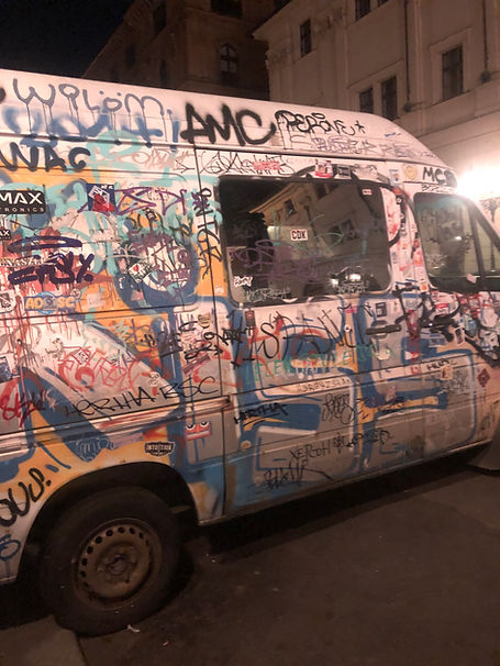 Photo of grafitti covered van in Prague