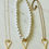 Thumbnail: Open hartjes ketting - parel