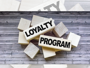 wooden blocks with the words loyalty progam