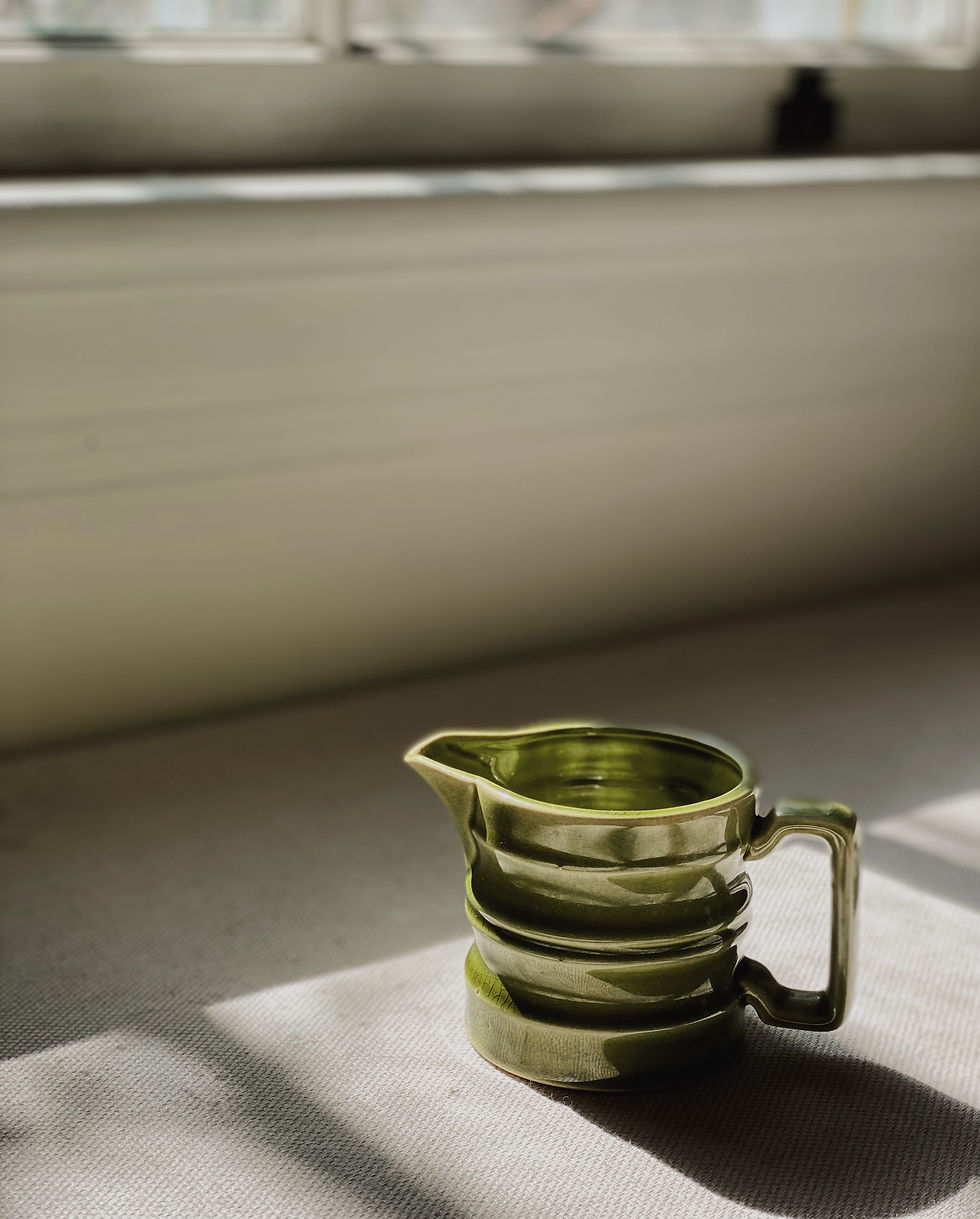 pot à lait vert