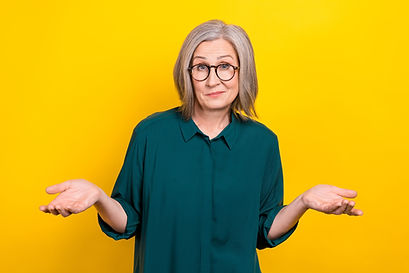 Senior woman shrugging while doing stand-up