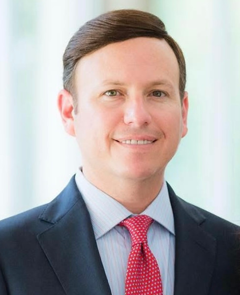 Scott Kamins Headshot blue suit, red tie, Kamins Consulting
