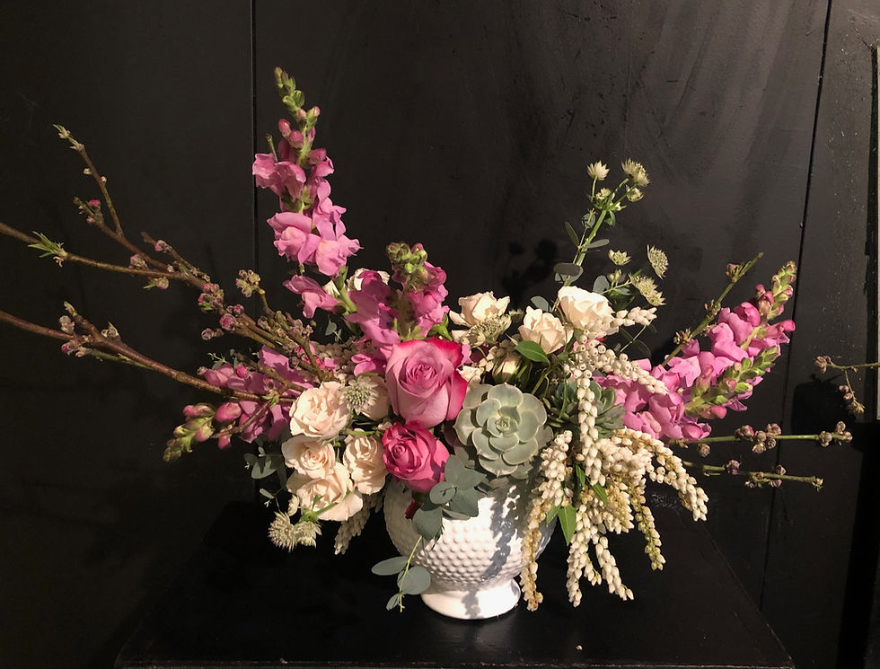 Designer's Choice Flowers like this exceptional bouquet provide customers with good value while allowing our floral designers freedom to work with seasonal blooms to create a unique bouquet like this one.