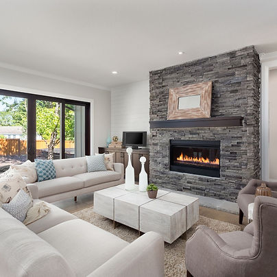 a modern living room with a fireplace