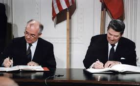 U.S. President Ronald Reagan and Soviet General Secretary Mikhail Gorbachev signing the INF Treaty in the East Room at the White House in 1987. The Intermediate-Range Nuclear Forces Treaty (INF) is a 1987 agreement between the United States and the Soviet Union. The treaty eliminated nuclear and conventional ground-launched ballistic and cruise missiles with intermediate ranges. (Photo by: Universal History Archive/UIG via Getty Images)