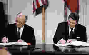 U.S. President Ronald Reagan and Soviet General Secretary Mikhail Gorbachev signing the INF Treaty in the East Room at the White House in 1987. The Intermediate-Range Nuclear Forces Treaty (INF) is a 1987 agreement between the United States and the Soviet Union. The treaty eliminated nuclear and conventional ground-launched ballistic and cruise missiles with intermediate ranges. (Photo by: Universal History Archive/UIG via Getty Images)